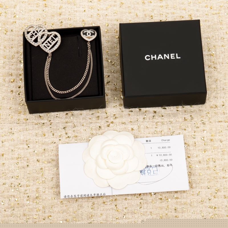 Ch*el brooches